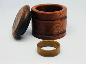 Handmade Walnut bentwood wedding band ring made in West Virginia.  Also a wood gift box made from Andiroba and Bubinga wood.